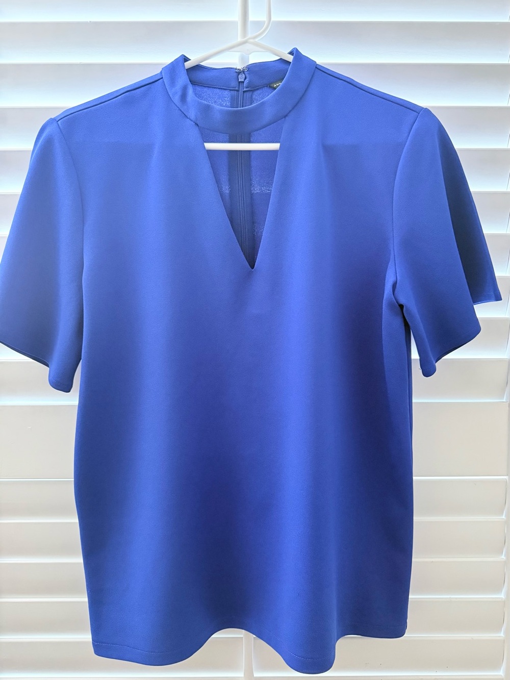 Ann Taylor cobalt blue short-sleeve mock-neck blouse